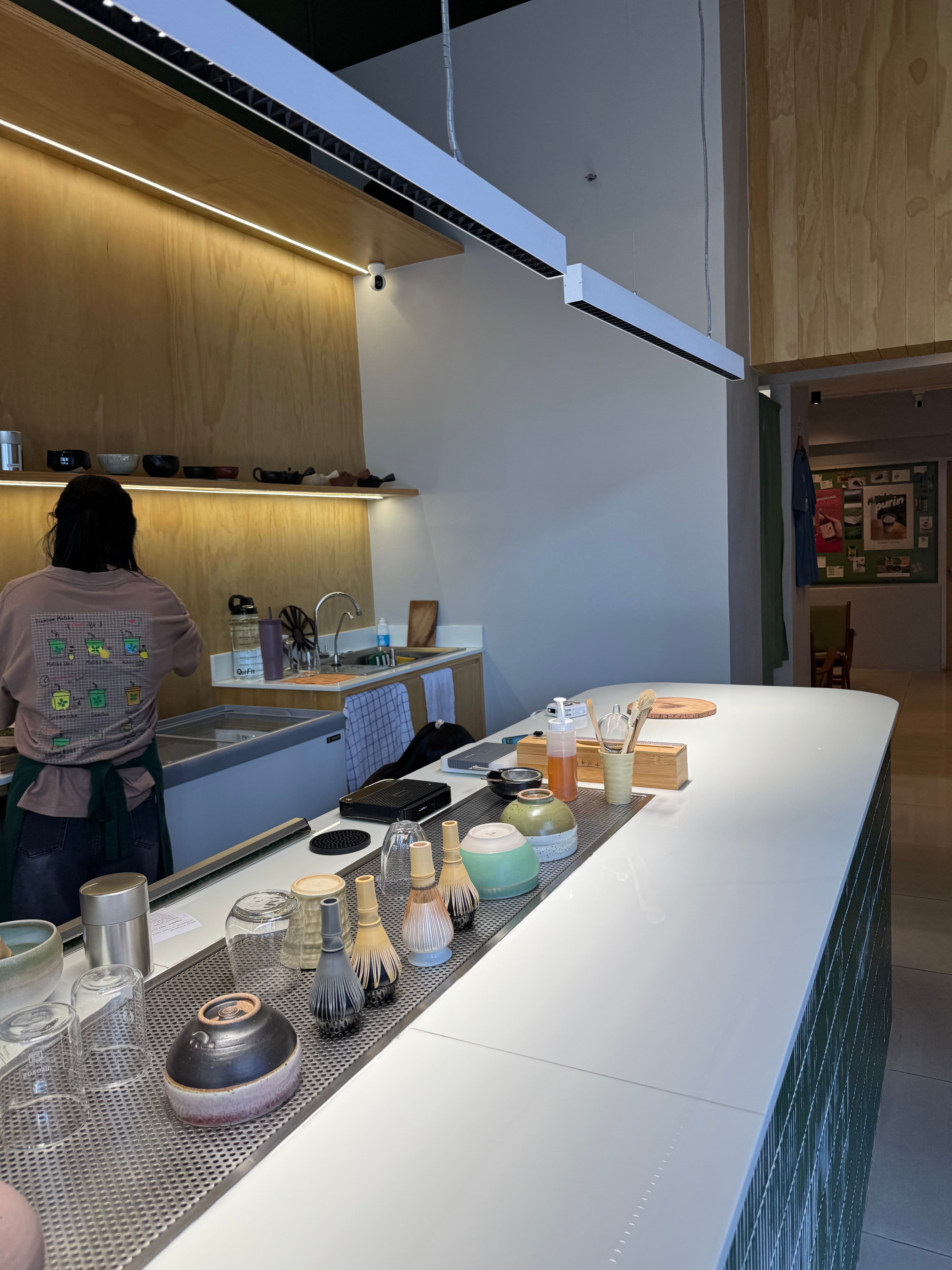 Cafe interior with display shelves and counter